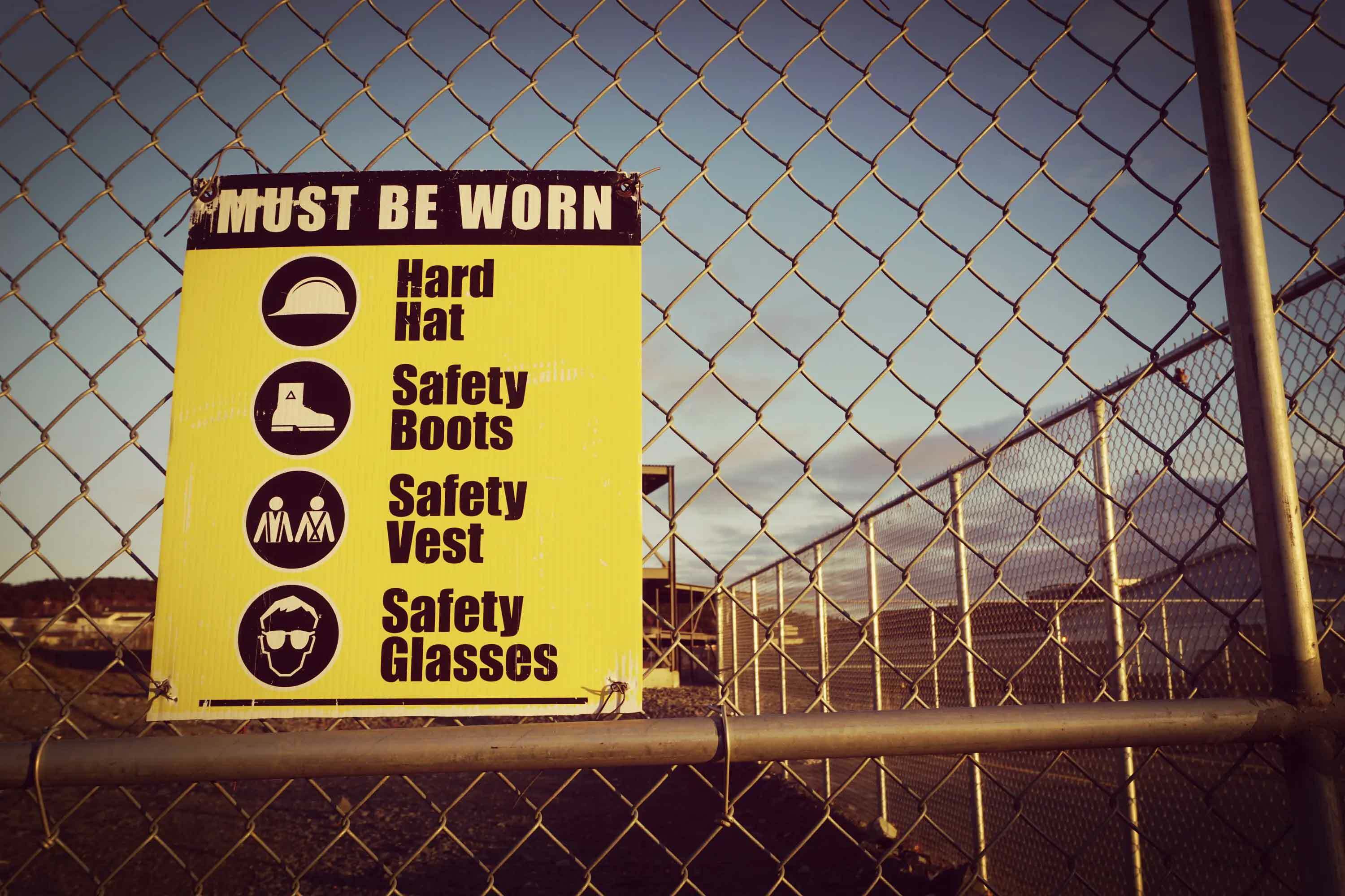 Hazard Warnings on a Fence